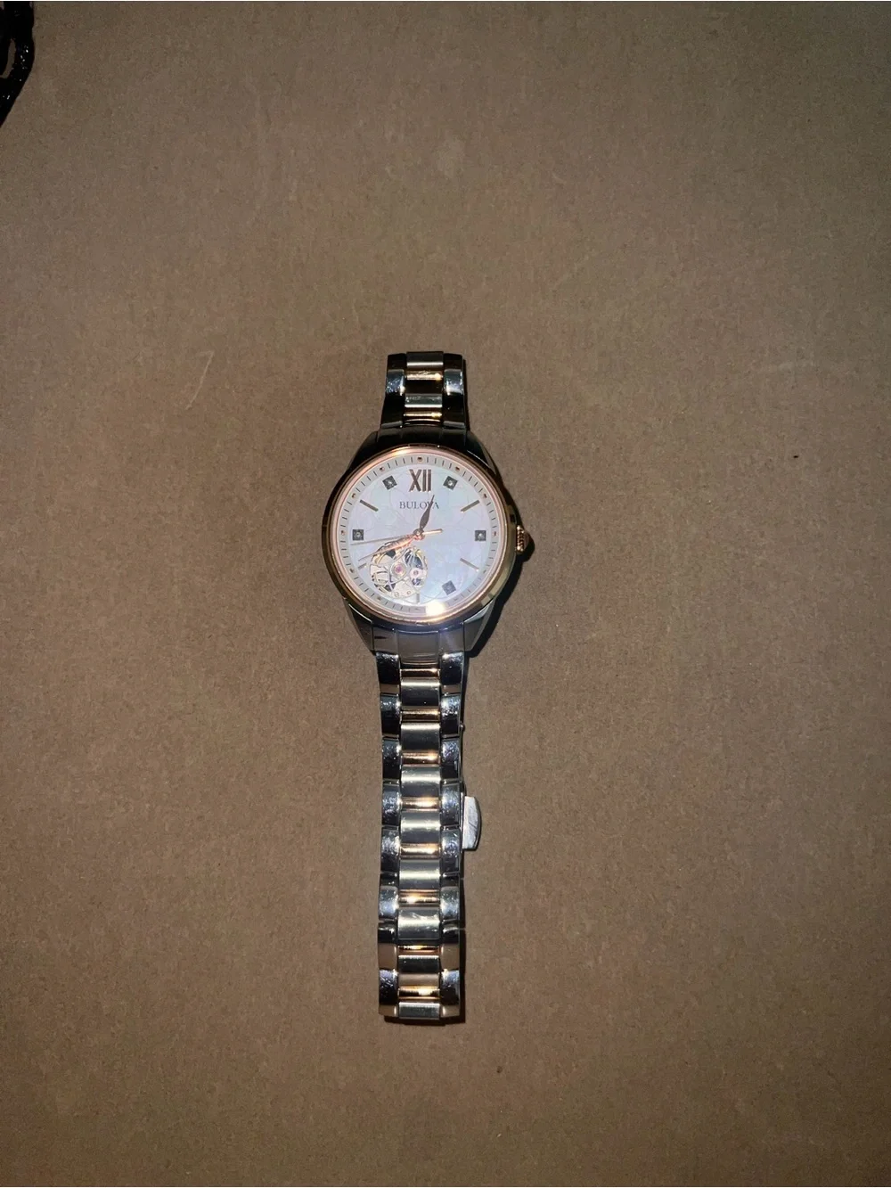 Bulova Two-Tone Silver and Rose Gold Open-Heart Bracelet Watch